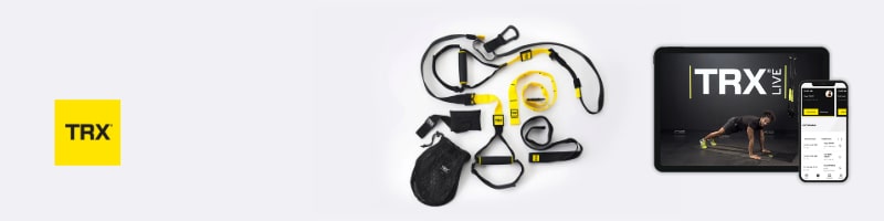 TRX suspension trainer kit with a tablet and smartphone TRX app, perfect for staying fit while traveling.