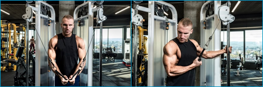 Traveler in a hotel gym works out on cable machines for chest and arms, dressed in a black tank top to stay fit while away.